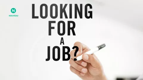 Une main écrit "looking for a job ?"